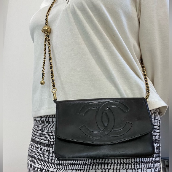 CHANEL Handbags - Vintage Chanel timeless wallet on chain black 24k gold